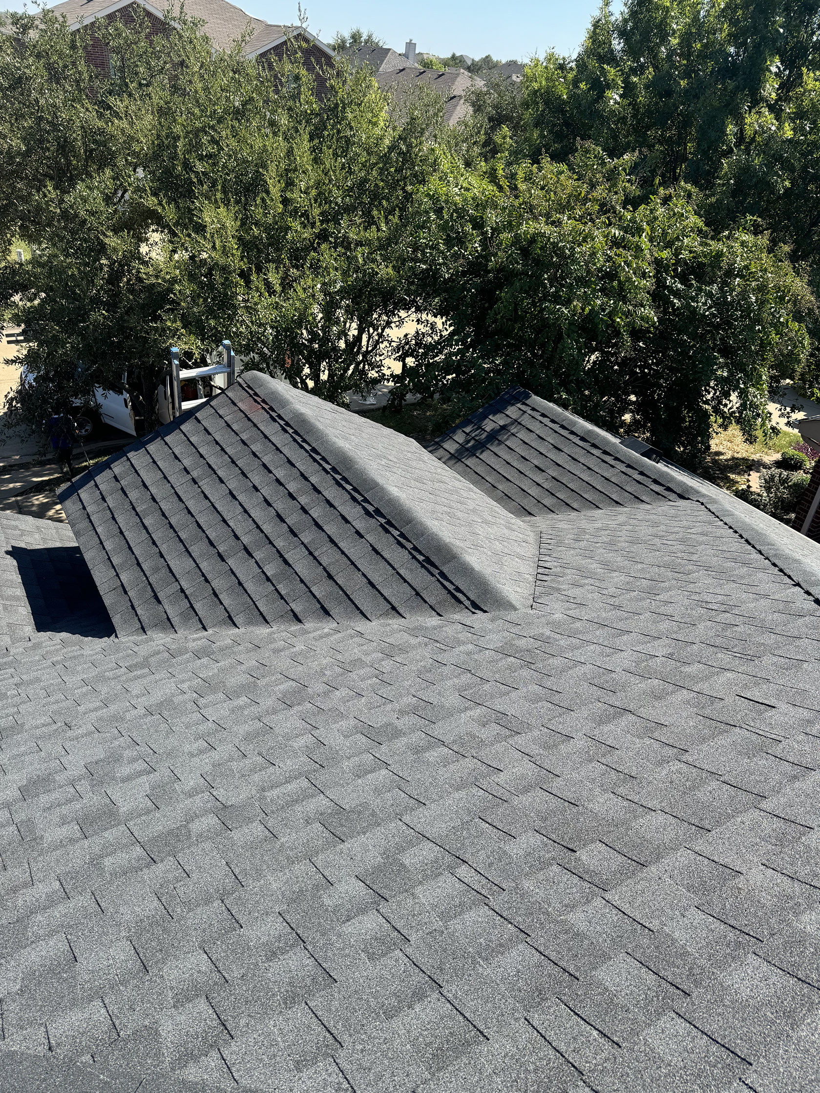 New roof shingles installed